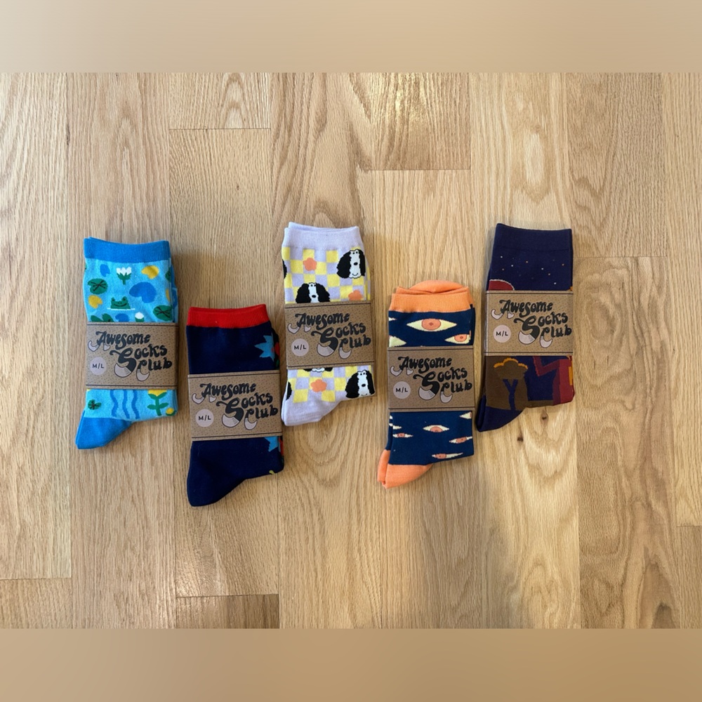 New with tags! Five pairs of socks with super cute designs for women! Size M/L